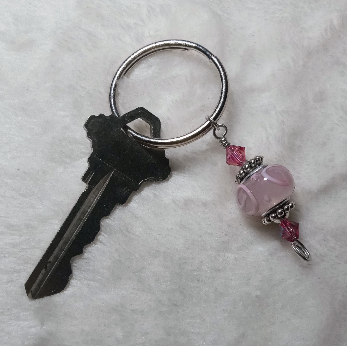 Wonderlust assorted black keychains
